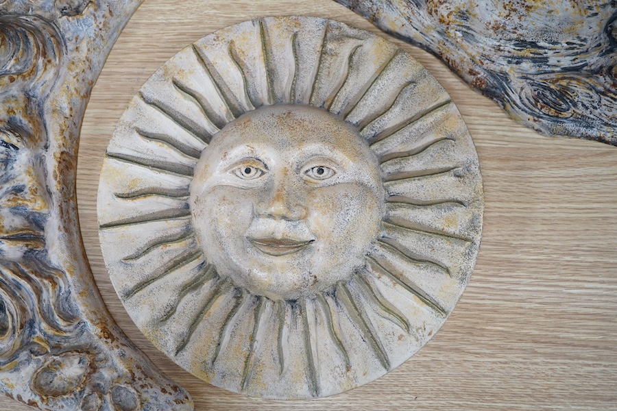 Three Welsh 'Pen-y-Bryn' studio pottery wall plaques comprising sun, moon and wind, largest 44cm. Condition - fair to good